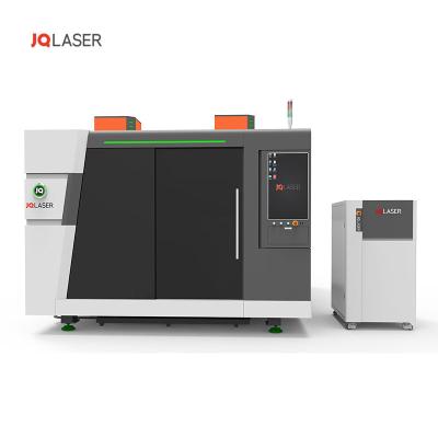 China JQ Laser 1530AP Machine Body Fiber Laser Cutting Machine Fully Enclosed Strong Metal Sheet for sale