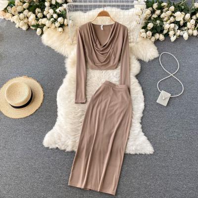 China Anti-pilling 2021 Korean Chic Deep V Collar Women's Casual Sets Temperament Bag Hip Bodycon Skirt Two-piece Set for sale