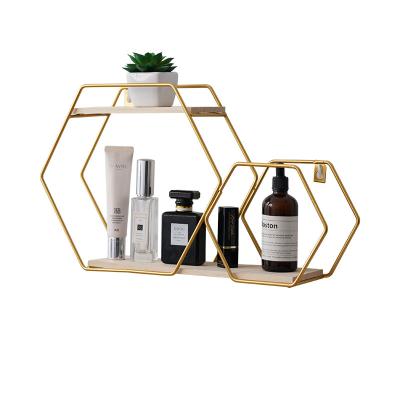 China Multi Function Bathroom Living Room Organizer Metal Small Polygon Wire Wall Storage Simple Home Rack for sale