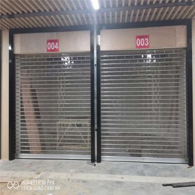 China Waterproof Polycarbonate Transparent Commercial Roller Shutter Door for sale