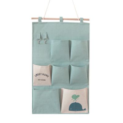 China Sustainable Nordic Cotton Wall Hanging Bags And Canvas Storage Bags Wall Bedroom Storage Bags for sale