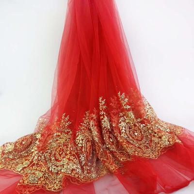 China 100%Polyester Organic Red Bottom Gold Glitter Bridal Dress Tulle Fabric for sale