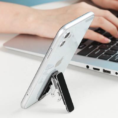 China Mini Metal Folding Phone Holder Aluminum Alloy Adjustable Phone Stand Invisible Foldable Stand For Iphone Samsung for sale