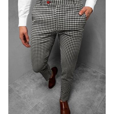 China Polyester/cotton men's slim fit small foot casual pants lace up striped pants fashion plaid elastic skinny pants men for sale