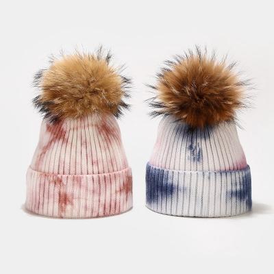 China COMMON women knit stylish hat tie dye winter hats with pom pom for adult beanie hats for sale