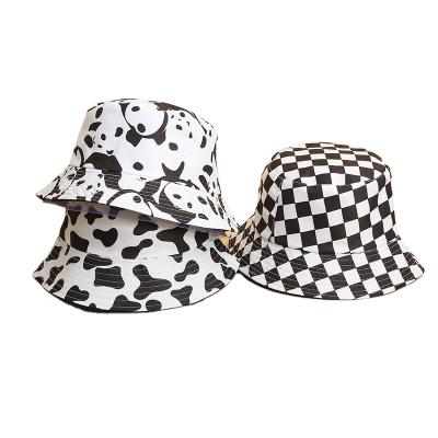 China Casual Wholesale Stylish Black Pink Cow All Over Reversible Animal Print Fisherman Print Bucket Hats Cap for sale