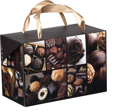 China Custom Recycled Materials Chocolate Box Packaging New Design Paper Gift Bag Box Party Favor Bag With Ribbon Handle Holiday And Birthday PA for sale