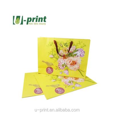 China Recyclable Custom Party Gift Shopping Glossy Paper Bag With Logo Print for sale