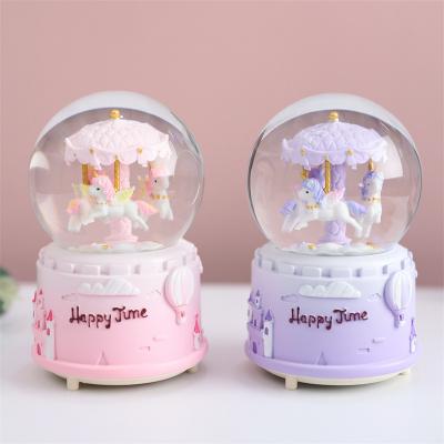 China Manufacturers New Handshake National Snowflake Carousel Colorful Crystal Ball Music Box Living Room Bedroom Decorations for sale