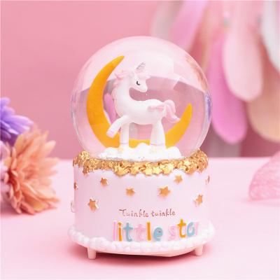 China Europe cartoon anime girl heart unicorn crystal ball with lights snow music box music box to send classmates birthday gift for sale