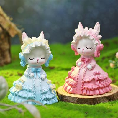 China Factory Wholesale Indoor Resin Crafts Worlwide Gifts Bunny Car Small Ornaments Supplies Creative Car Baking Cake Decorations for sale