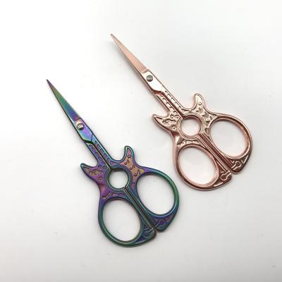 China Professional Guitar Rainbow Embroidery Production Scissors Titanium Eyelash Scissors Nose Scissors for sale