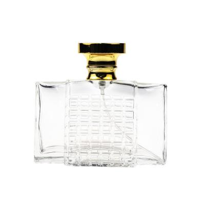 China Free Sample 90ml Cosmetic Empty Glass Perfume Bottle With Embossed Luxury For Car for sale