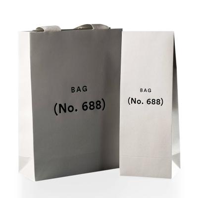 China Luxury Recyclable Custom Printed Biodegradable Gift Craft Paper Shopping Bags With Handle for sale