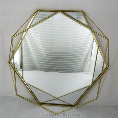 China Luxury Geometric Handcrafted Metal Gold Plated Iron Home Decor Wall Mirrors for sale