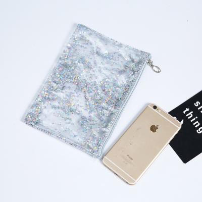 China Summer Cosmetic Fashionable Beach Bag Envelope Sequin PVC Wholesale Bag Waterproof Transparent Quicksand Handbag for sale