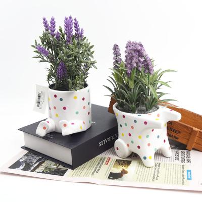 China Popular Cartoon Shape Dot Wave Ceramic Potted Purple Artificial Lavender Flower Plants Decor for sale