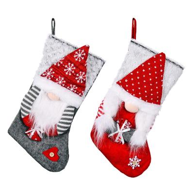 China Trendy Personalized Christmas Gnome Stocking Pop It Gray Christmas Stocking Plush Santa Christmas Stocking Decor Red Supplies for sale