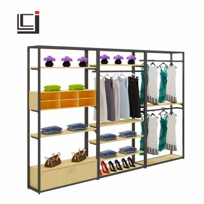 China Corrosion protection steel-wood clothing display racksclothing and garment shelves manufacturers can be customized for sale