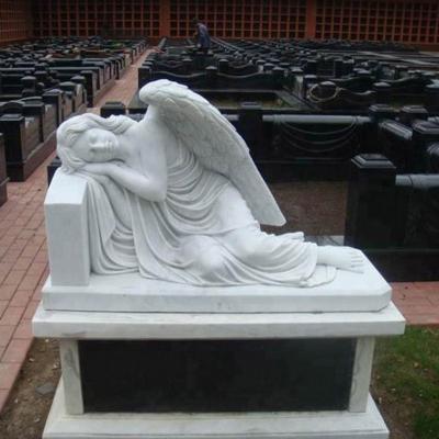 China Western High Quality White Marble Lying Down Angel Statue With Black Base Carving for sale