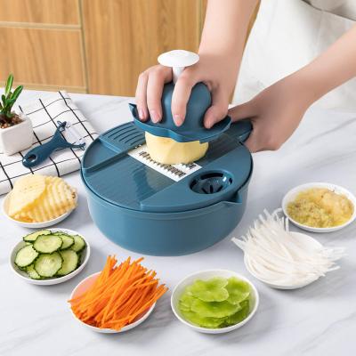 China Sustainable vegetable chopper cutter multifunction 12 In 1 Wet Basket Fruit Vegetable Cutter Peeler Slicers Kitchen for sale