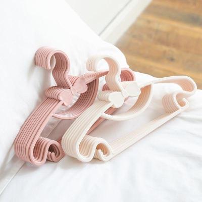 China Eco-friendly Material High quality cheap price plastic coats hanger children coats hanger portable clothes racks for sale