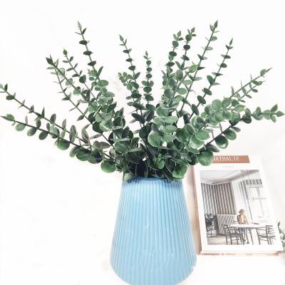 China Decoration Eucalyptus Leaves Fake Plants Flower Material For Wedding Flower Wall Decoration Greenery Plant Leaf Home Decor for sale