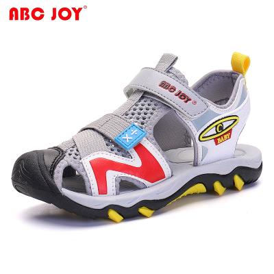 China Fashion Waterproof Summer New Arrival Anti-Skid Outdoor Rise Protect Toe Beach Sandals For Boys for sale