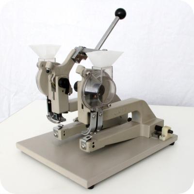 China Manual Two Head Eyelet Punch Machine Easy To Operate for sale