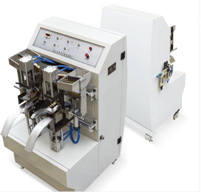 Китай Factory price factory price four heads double paper bag heads supply eyelets machine for sale продается