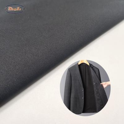 China Hertz Elastic Fabric Fusible Woven Interlining Textile Wholesale Stock Lot China Manufacturer for sale