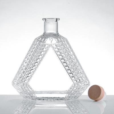 China Cheapest Beverage 100ml Screen Printing Triangle Shape Vodka Bottle With Lid for sale