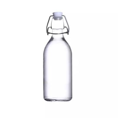 China 600ml Glass Beverage Bottle With Stopper Caps Decanter Swing Top Beer Bottle Kombucha Bottle Beverage for sale