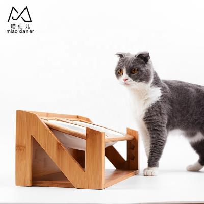 China Sustainable N-Shape Bamboo Pet Cat Dining Table With Double White Ceramic Pet Bowls for sale