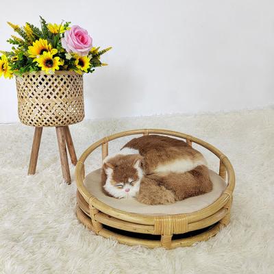 China Cane Natural Rattan Elevated Round Durable Handmade Breathable Wicker Pet Bed For Small Dogs Cats With Deluxe Removable Cushion for sale