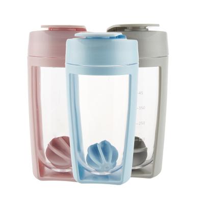 China Customized Viable Shape Bounce Lid Plastic Water Bottles Shaker With Handle for sale