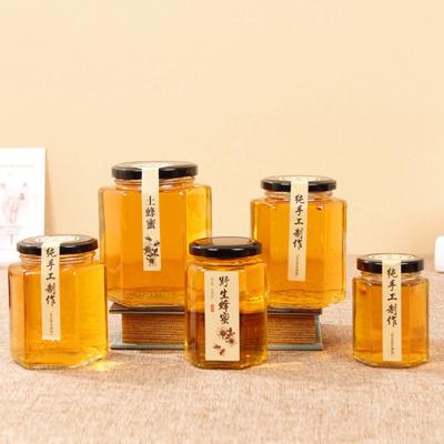 China Nordic Style Hexagonal Glass Honey Jar 380Ml Canned Pickles Block Birds Nest Jar Sealed Glass Honey Jar for sale