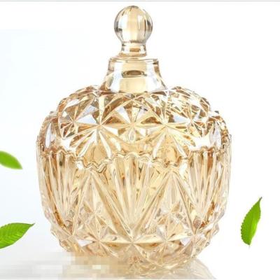 China Stocked Colored Glass Candy Jar With European Cover Storage Jar Gold Glass Storage Jar for sale