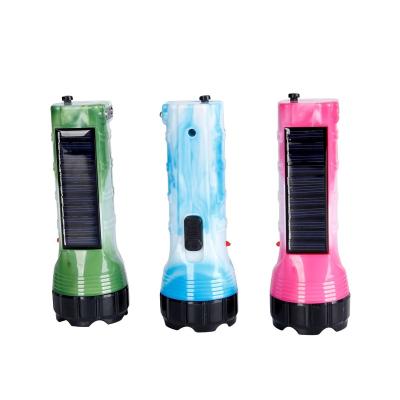 China Plug Energy Saving Charger Led Plastic Camouflage Rechargeable Solar Torch Light Flashlight for sale