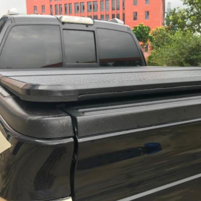 China Easy Installation Retractable Stocklot Roll Folding PVC Tonneau Cover hilux revo for hilux for sale