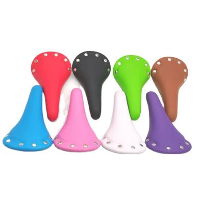 China Simple hot new products color comfortable retro rivet bicycle saddle leather road bike saddle for sale