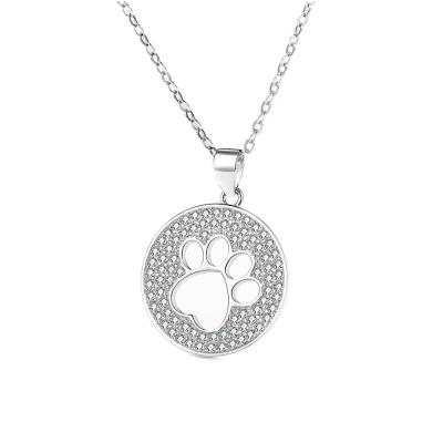 China 00022 925 Sterling Silver Hollow Dog Paw Charm Cute Circle Paw Pendant Pet Jewelry for sale