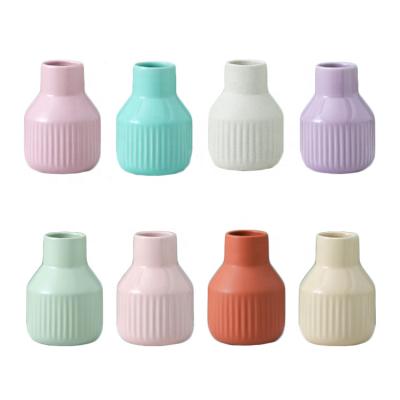 China Colorful stripes of small modern minimalist home decoration fancy style ceramic and porcelain vases for sale