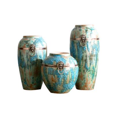 China Minimalist Elegant Fancy Hollow Blue Bubbles Ceramic Vase With Copper Rings For Flowers Decoration for sale