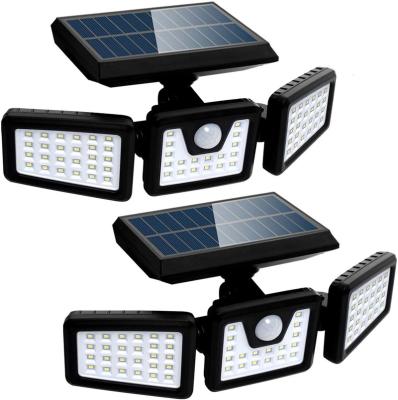 China Modern Solar Motion Sensor Lights 3 Heads Security LED Lights Outdoor Solar Powered Flood Light Motion Detected Floodlight For Garage for sale