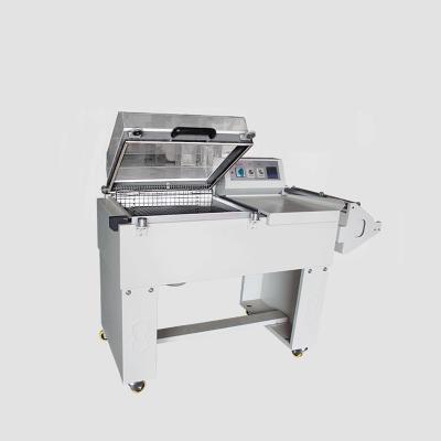 China Hot Sale Semi Automatic GARMENT Shrink Wrapping Machine Small Shrink Wrapping Machine Shrink for sale