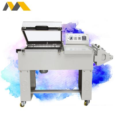 China GARMENT shrink wrap machine for books shrink 2 in 1 one step shrink wrap machine shrink packaging system for sale