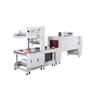 China Semi automatic beverage film shrink sleeve shrink wrap packaging machine with shrink tunnel with PE shrink film for sale