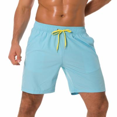 China Customized Breathable Beach Swim Shorts Mens Swimming Trunks Mens Swimwear Sports Shorts With Pockets for sale