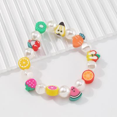 China Cute colorful Bohemian style pottery soft fruit style bracelet beautiful girl heart pearl hand ornament imitation bracelet for sale